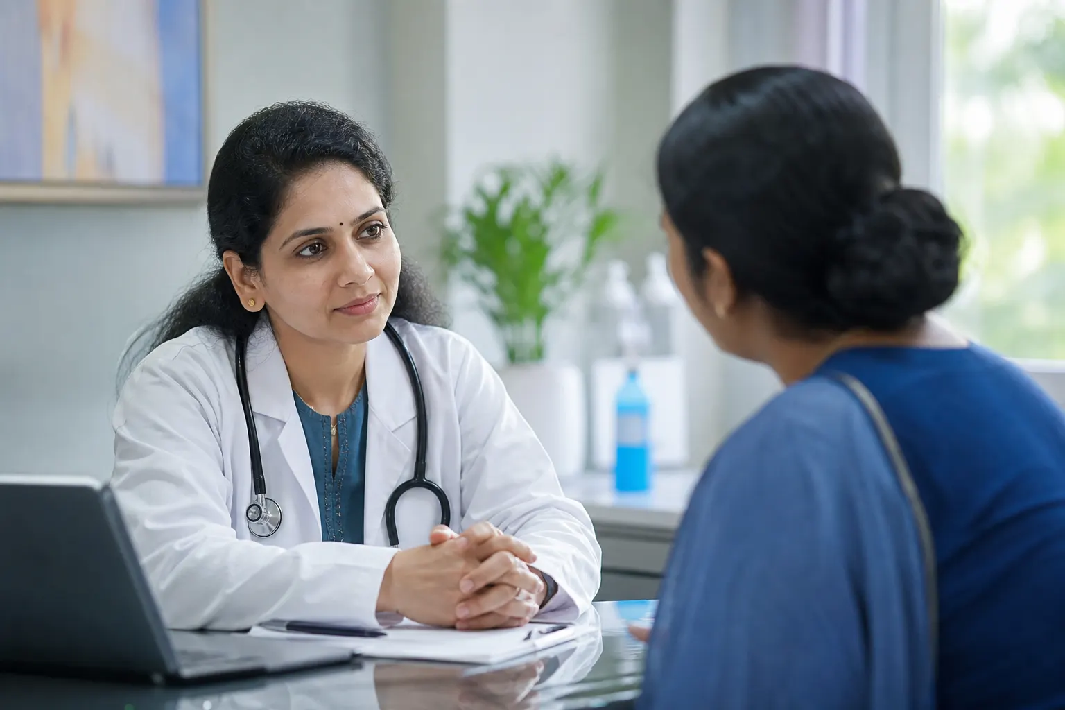 Doctor listening to a patient during a calm private consultation