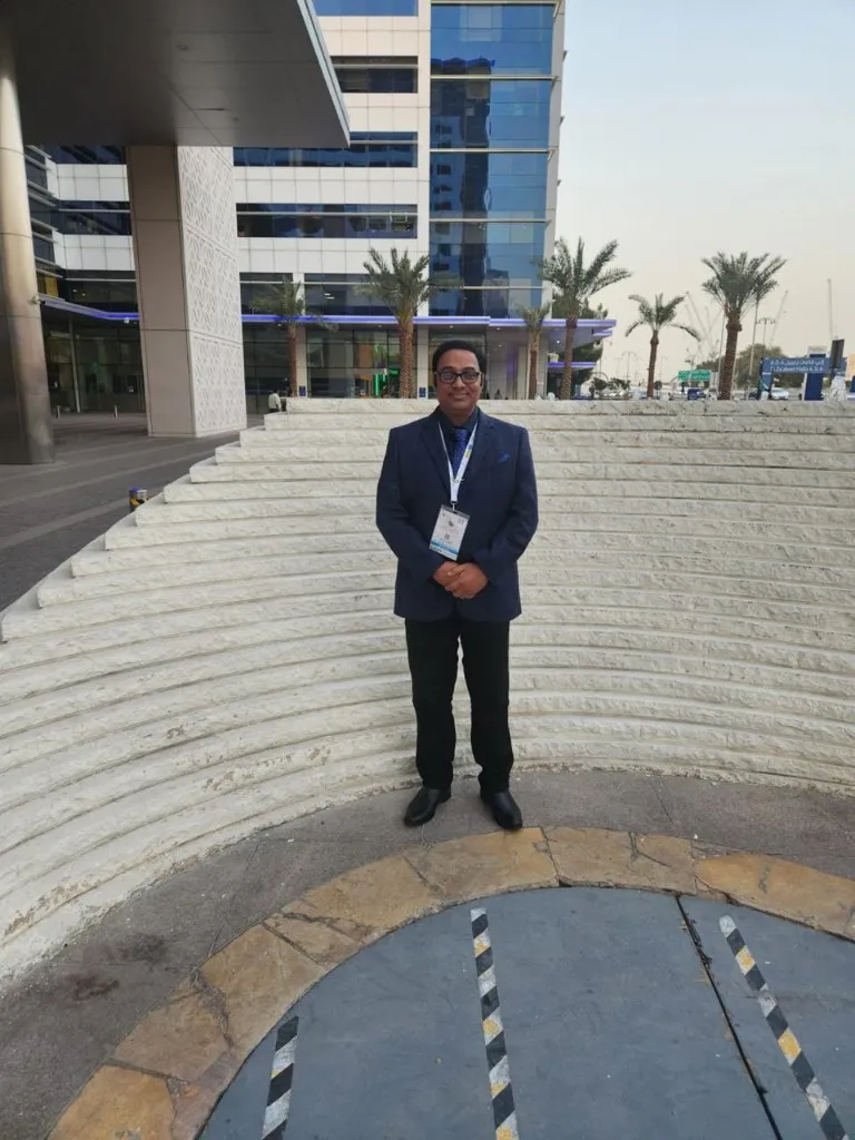 Dr. Anuj Kumar at a conference venue in Dubai