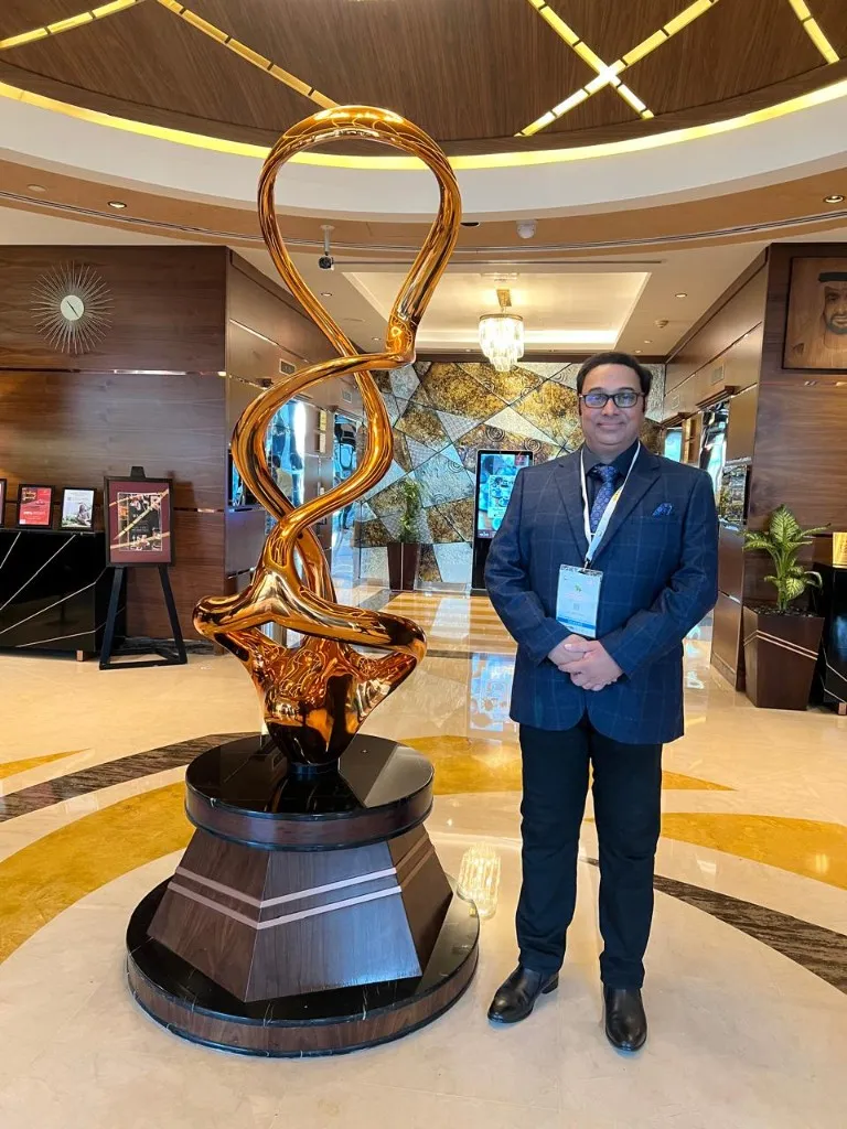 Dr. Anuj Kumar in a hotel lobby during a professional visit